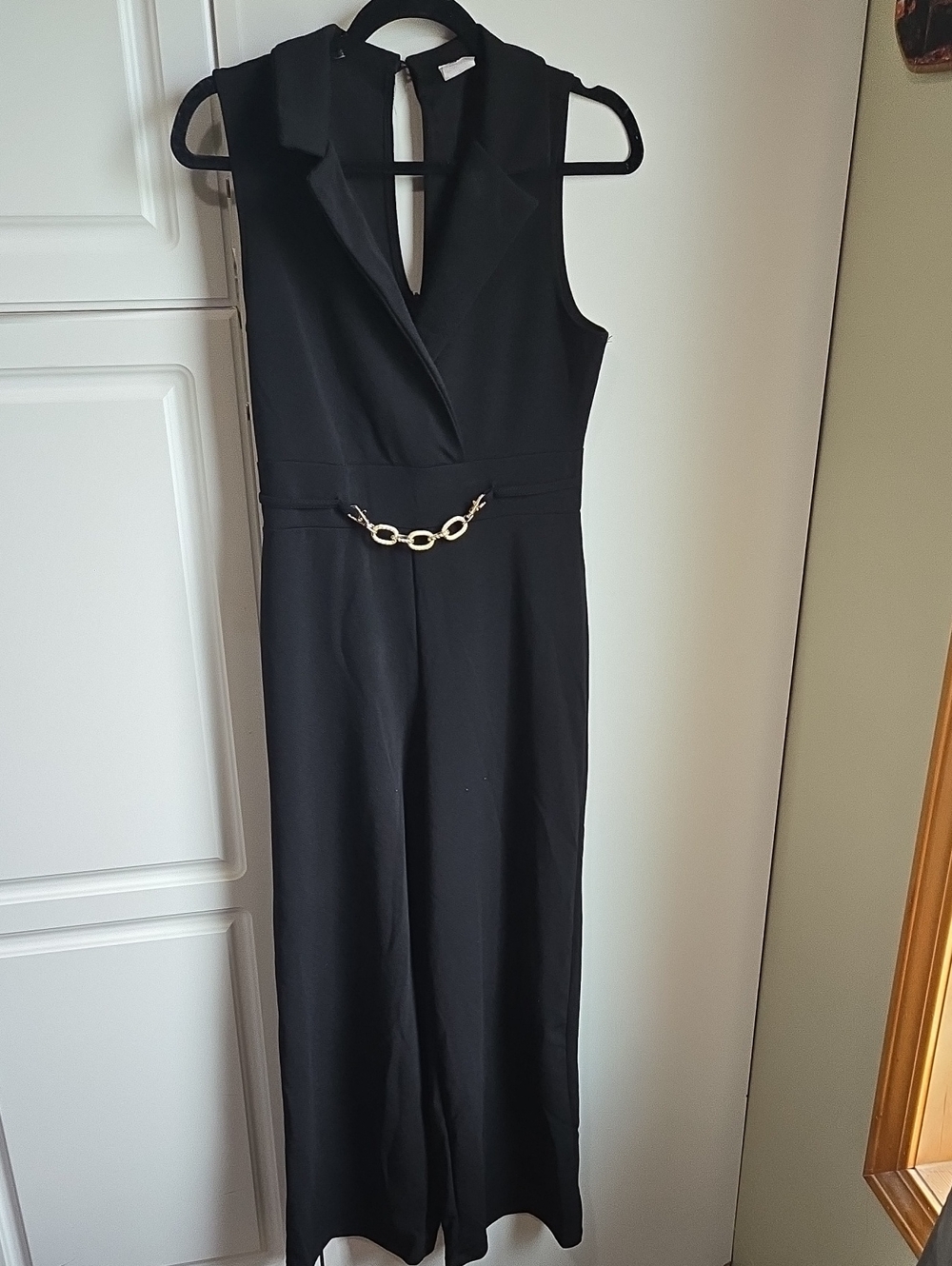 No Boundaries Black Sleeveless Jumpsuit with Gold Chain Accent